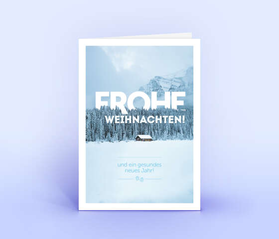 Hellblaue Weihnachtskarte mit verschneiter Berghütte 7069